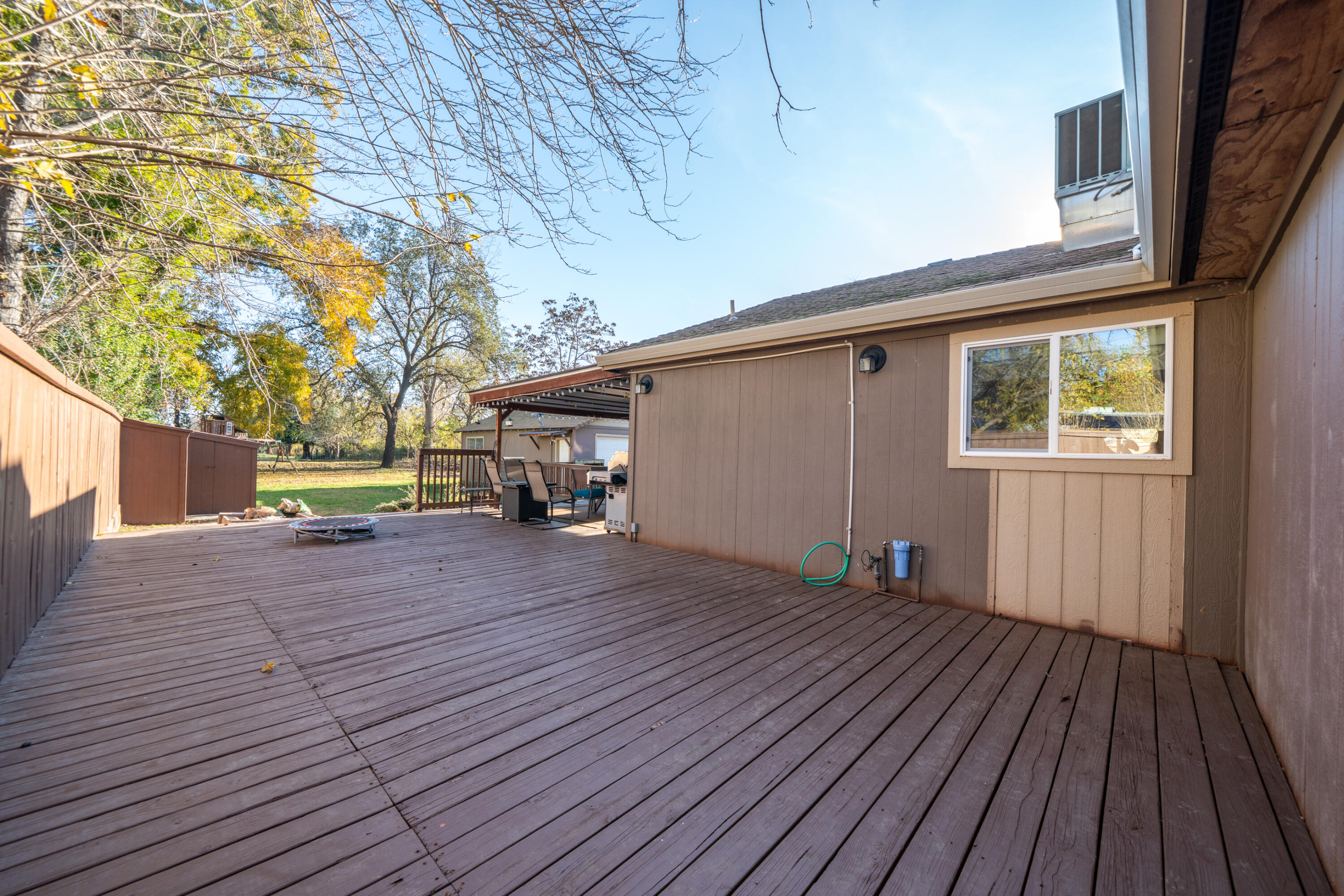 2385 Alexander Avenue Anderson, CA 96007 - Photo 39 of 72 a view of a house with a wooden deck