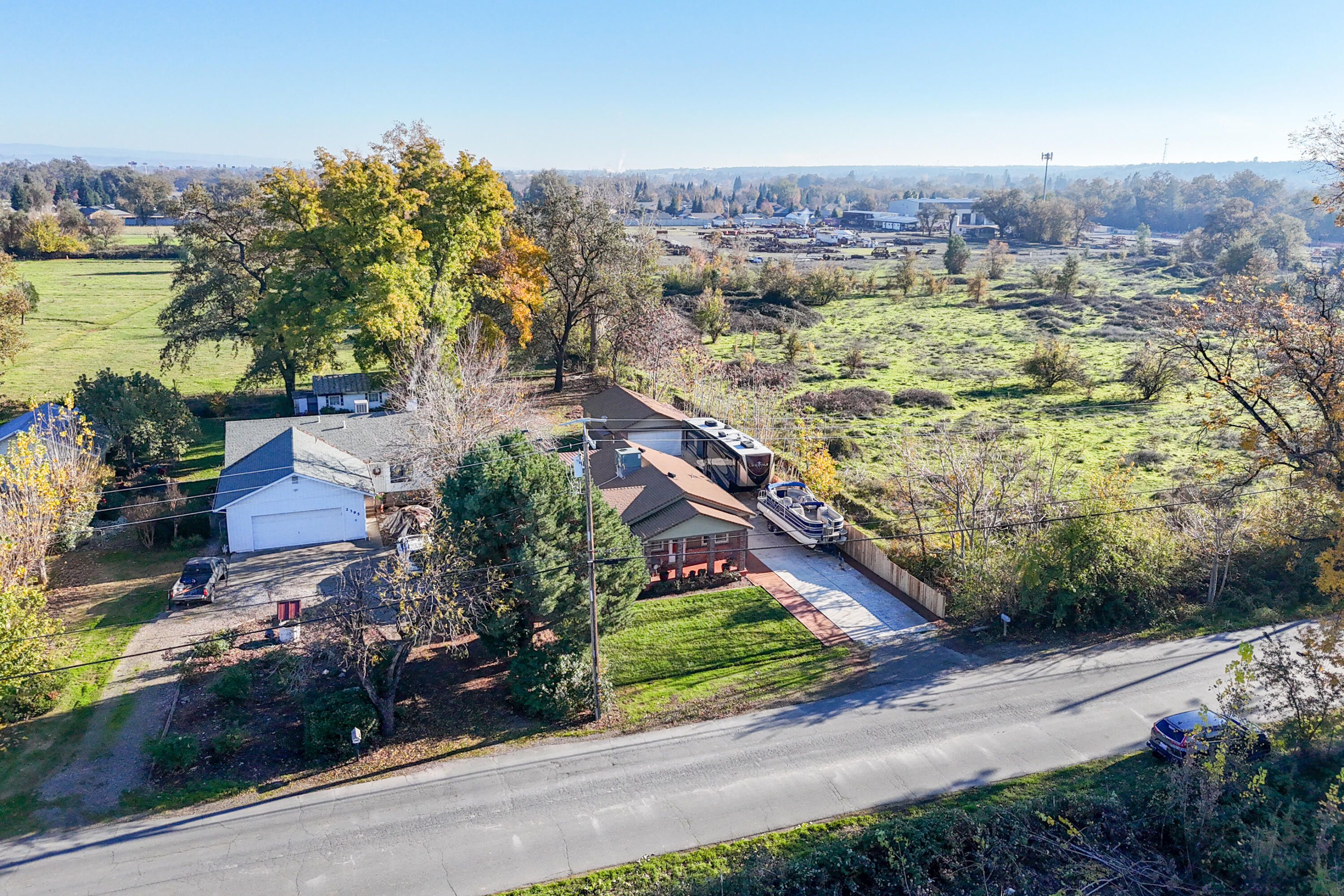 2385 Alexander Avenue Anderson, CA 96007 - Photo 58 of 72 an aerial view of residential houses with outdoor space and trees