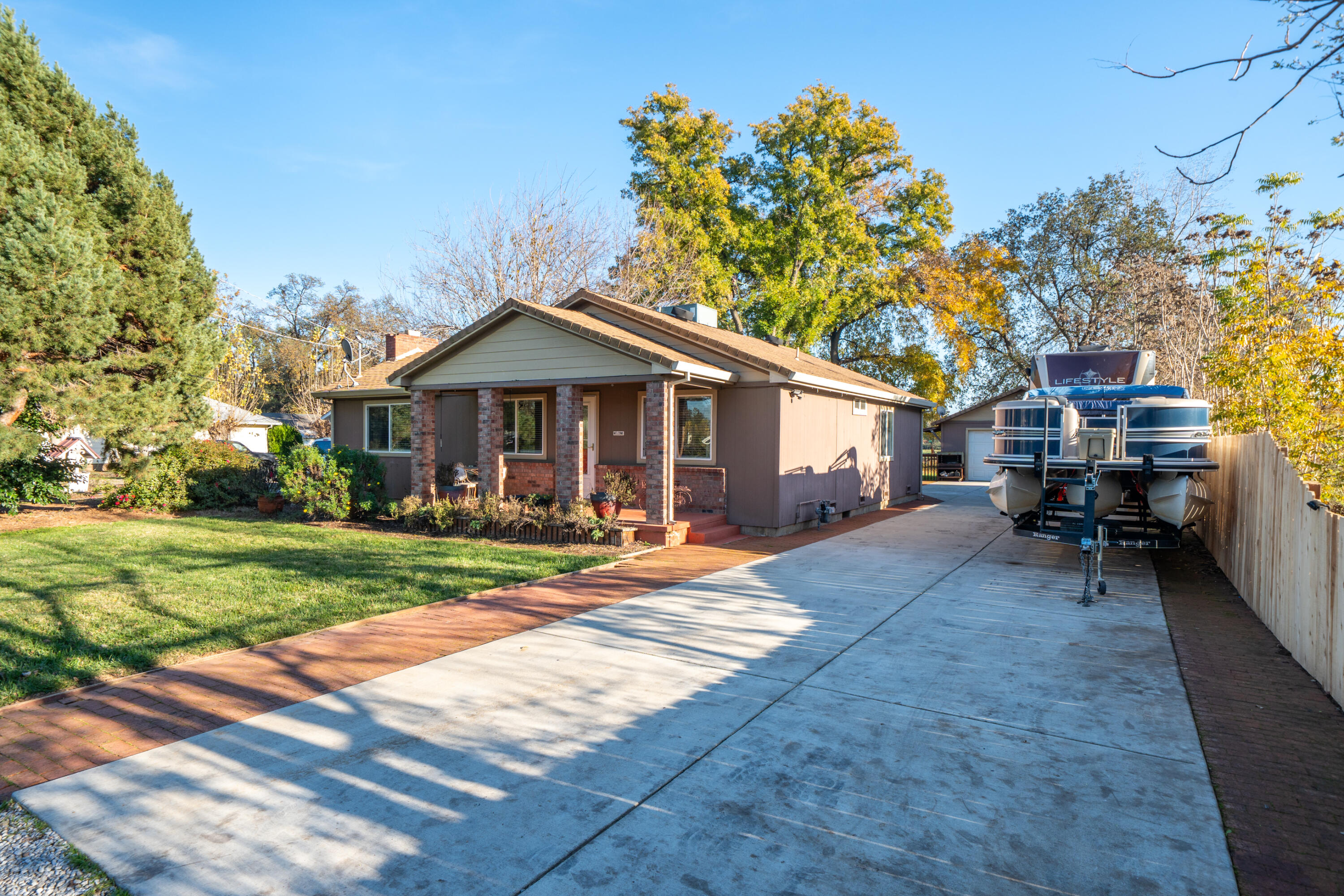 2385 Alexander Avenue Anderson, CA 96007 - Photo 70 of 72 a view of a house with a yard and sitting area