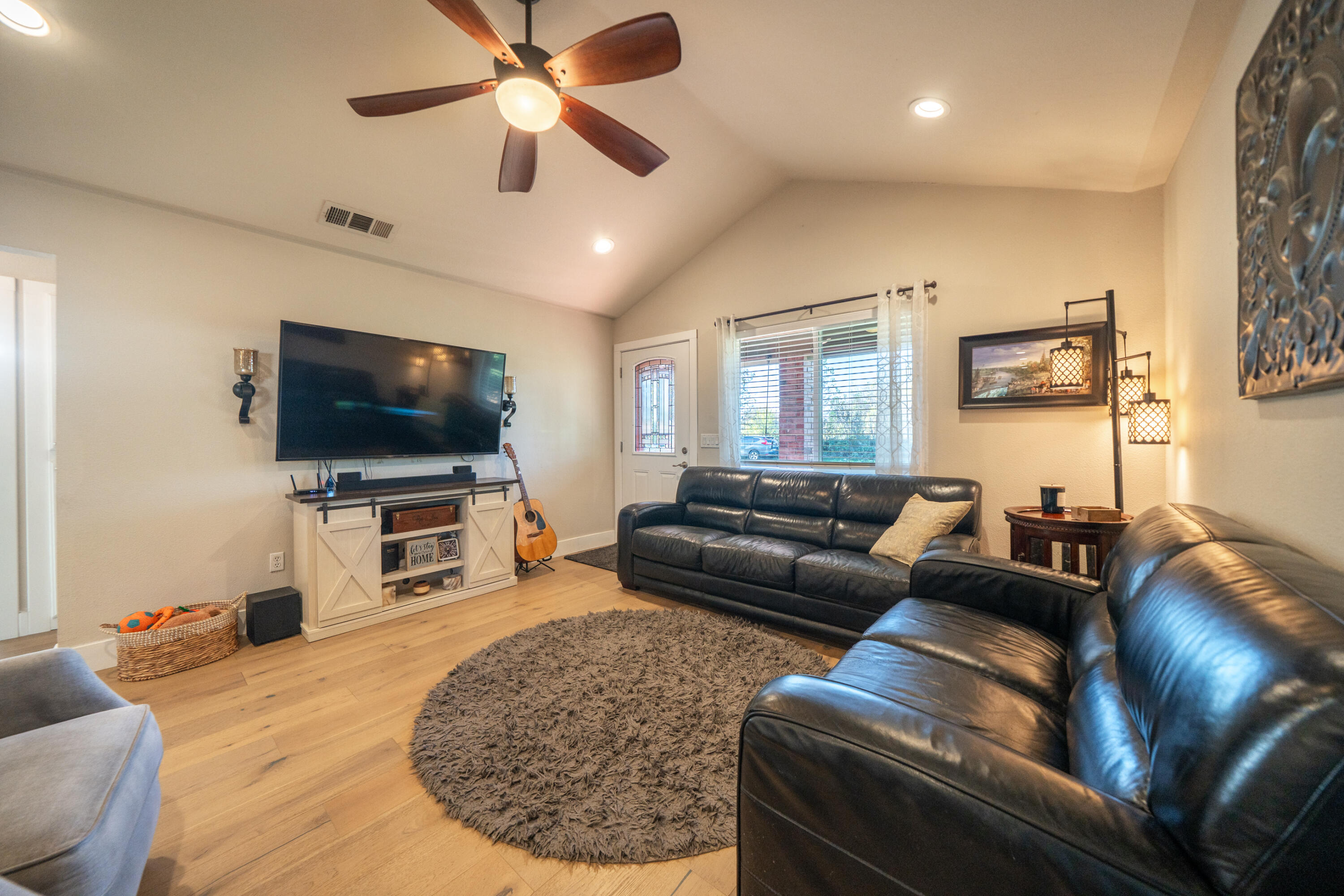 2385 Alexander Avenue Anderson, CA 96007 - Photo 7 of 72 a living room with furniture and a flat screen tv