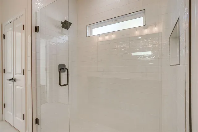 a kitchen with stainless steel appliances granite countertop a sink and a stove