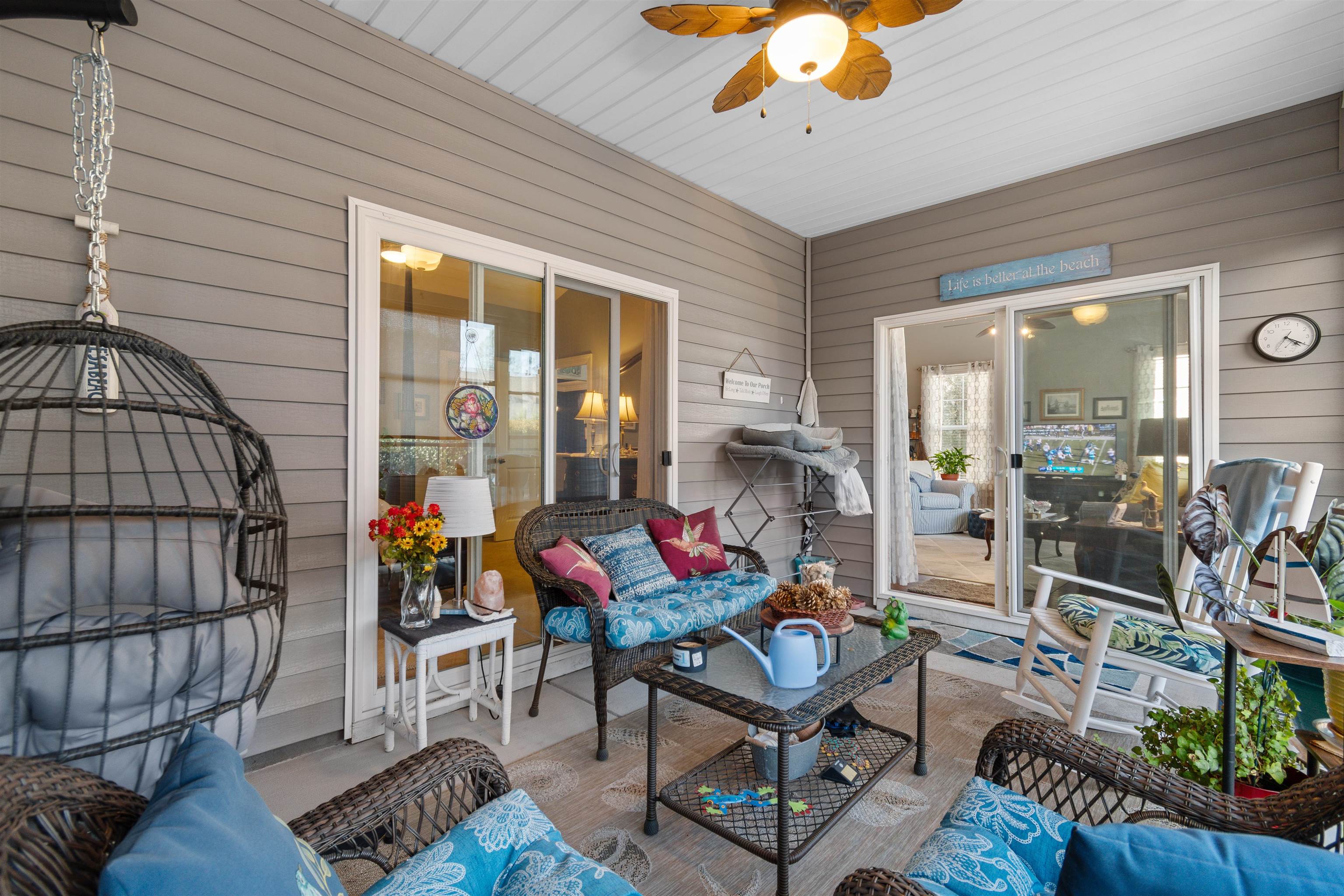 5459 Elba Way, Unit 1501 Myrtle Beach, SC 29579 - Photo 17 of 31 Sunroom featuring ceiling fan, outdoor lounge area, wooden walls, and wooden ceiling
