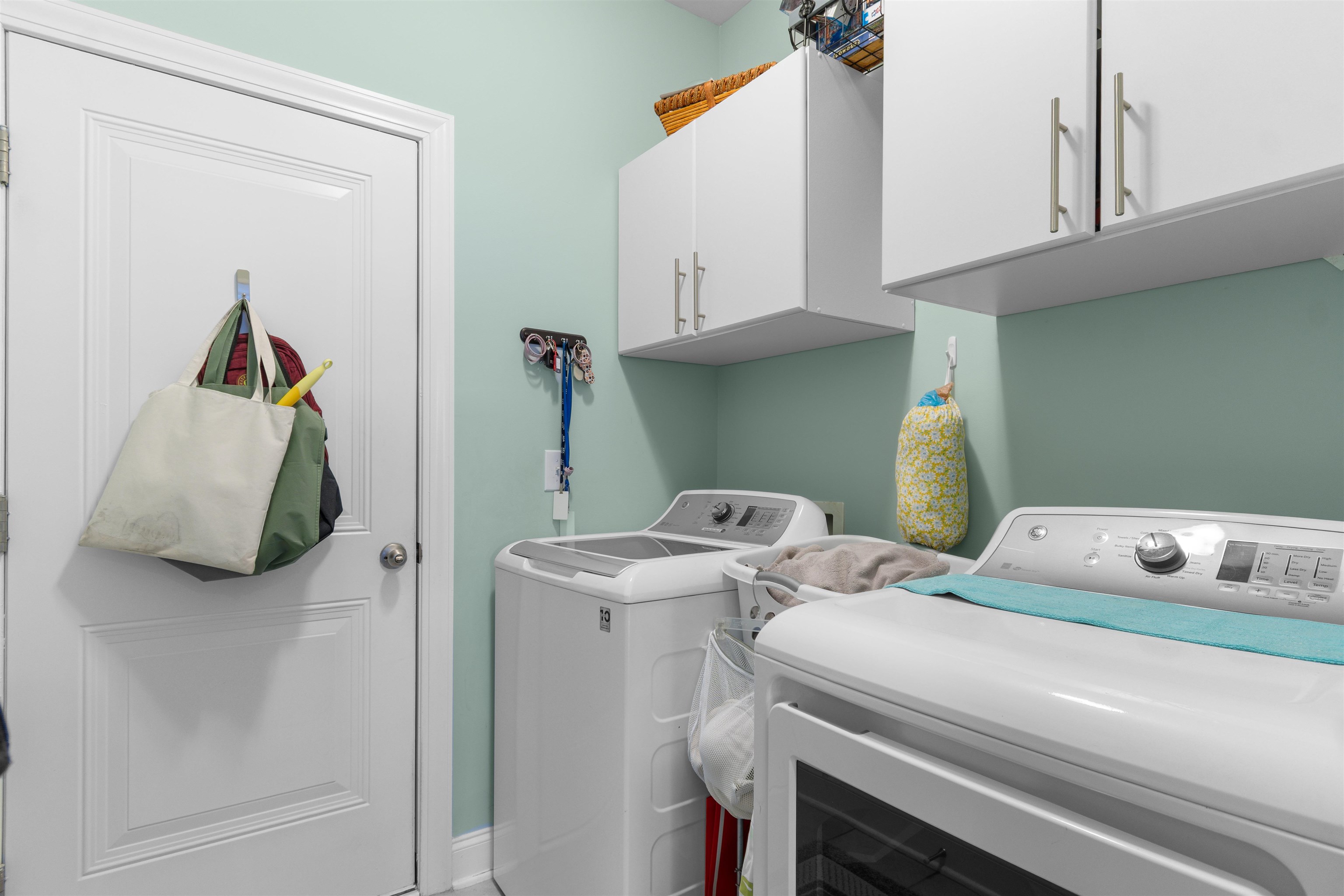 5459 Elba Way, Unit 1501 Myrtle Beach, SC 29579 - Photo 24 of 31 Bedroom with lofted ceiling, light carpet, a ceiling fan, and a closet