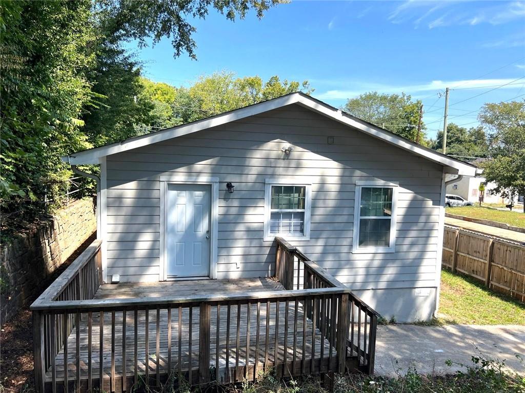 566 Rockwell Street Southwest Atlanta, GA 30310 - Photo 20 of 23 a view of a house with a yard
