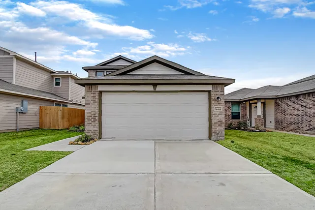 a front view of house with yard