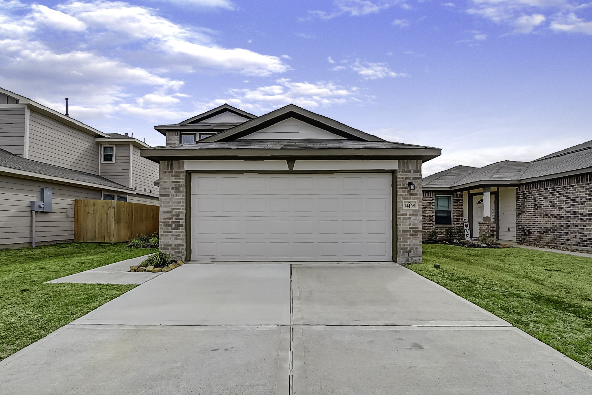 14468 Conifer Drive Conroe, TX 77302 - Photo 2 of 21 a front view of house with yard