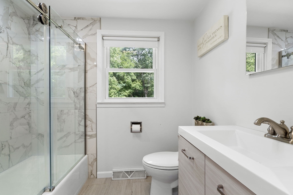 8 Governor Fuller Road Billerica, MA 01821 - Photo 17 of 33 a bathroom with a sink toilet and shower