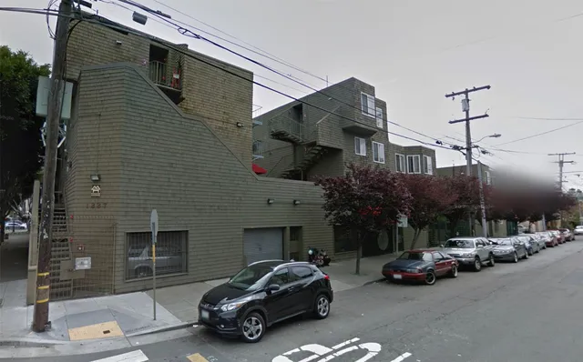 a car parked in front of a building