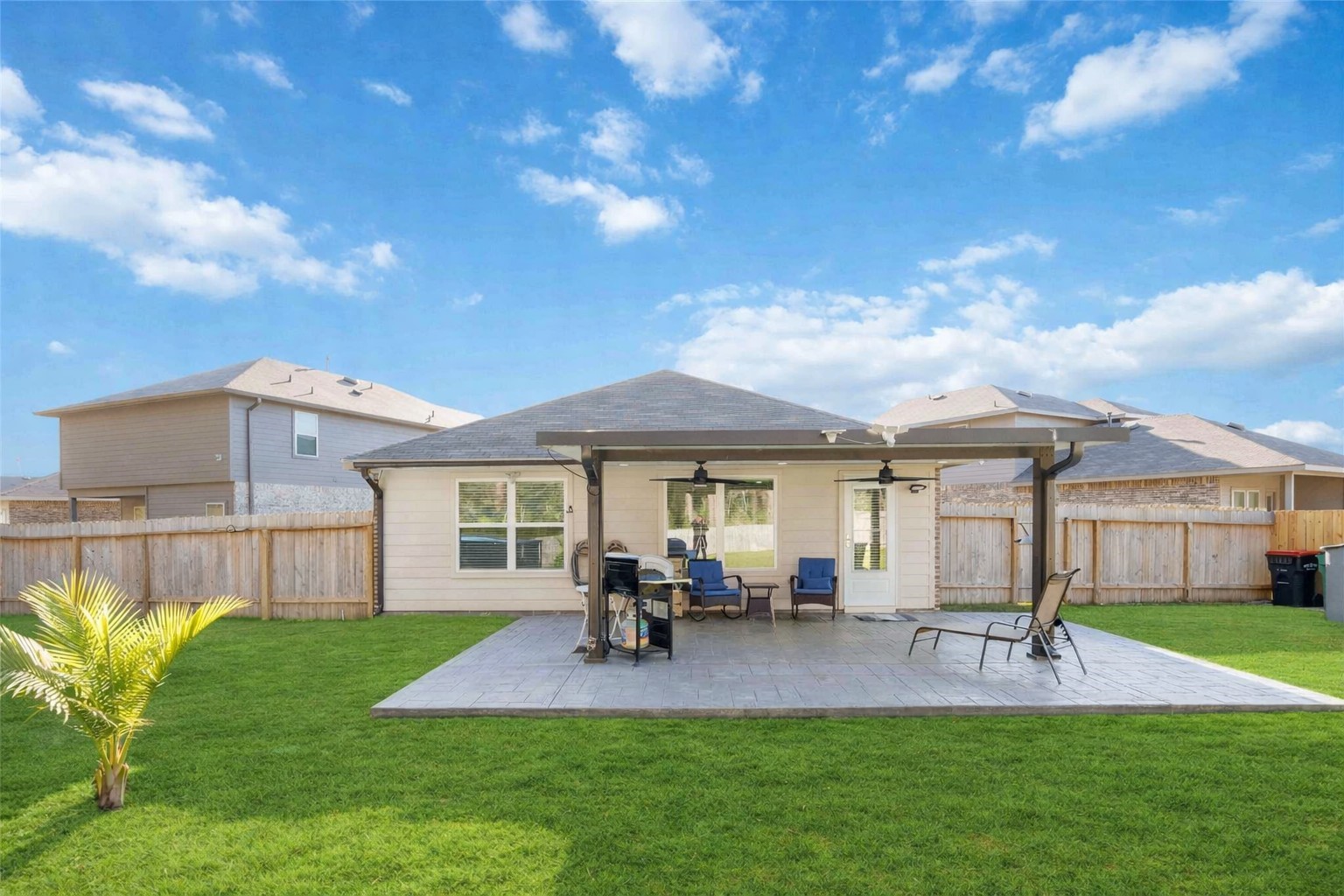 24034 Sunview Vly Drive Spring, TX 77373 - Photo 4 of 43 Backyard & Covered Patio View
Expansive backyard designed for endless entertaining and relaxation, featuring an extended covered patio with ceiling fans, space for outdoor dining and lounging, and seamless indoor-outdoor flow. Enjoy Summer fun in the fully fenced yard provides privacy and room for gatherings, play, or pets. A perfect setup for hosting, weekend barbecues, or unwinding in your own private outdoor retreat.