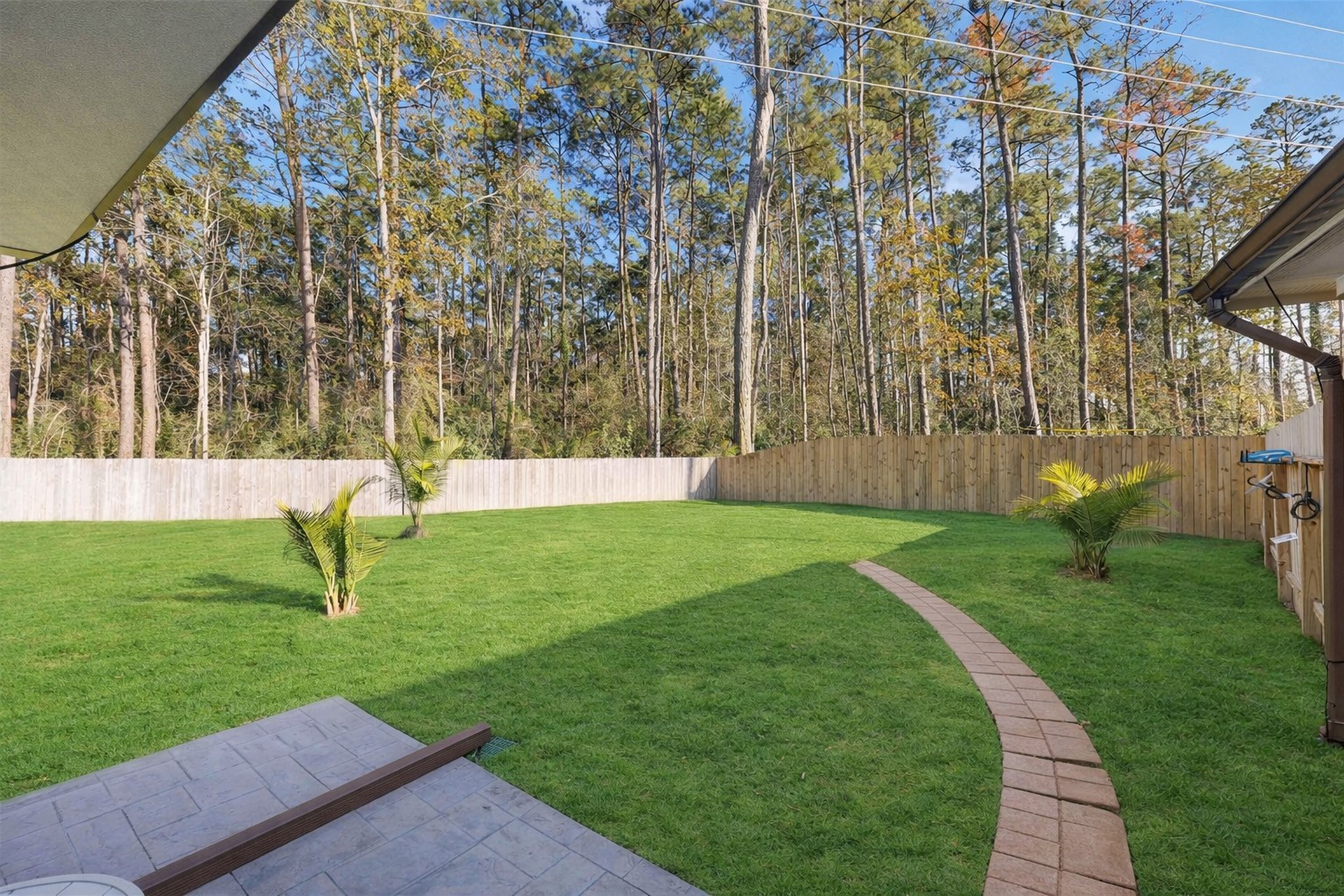 24034 Sunview Vly Drive Spring, TX 77373 - Photo 8 of 43 Enjoy your own private retreat in your spacious, fully fenced yard with no rear neighbors, providing privacy and plenty of room for entertaining, play, or additional outdoor features. A perfect complement to the home’s exceptional outdoor living space.