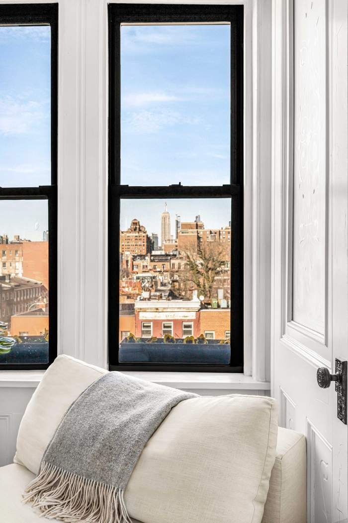 64 MacDougal Street, Unit 22 Manhattan, NY 10012 - Photo 6 of 13 a view of a room with a bed