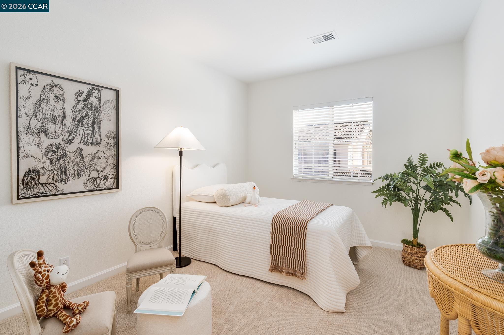 7110 Briza Loop San Ramon, CA 94582 - Photo 15 of 25 a bedroom with a bed and a potted plant