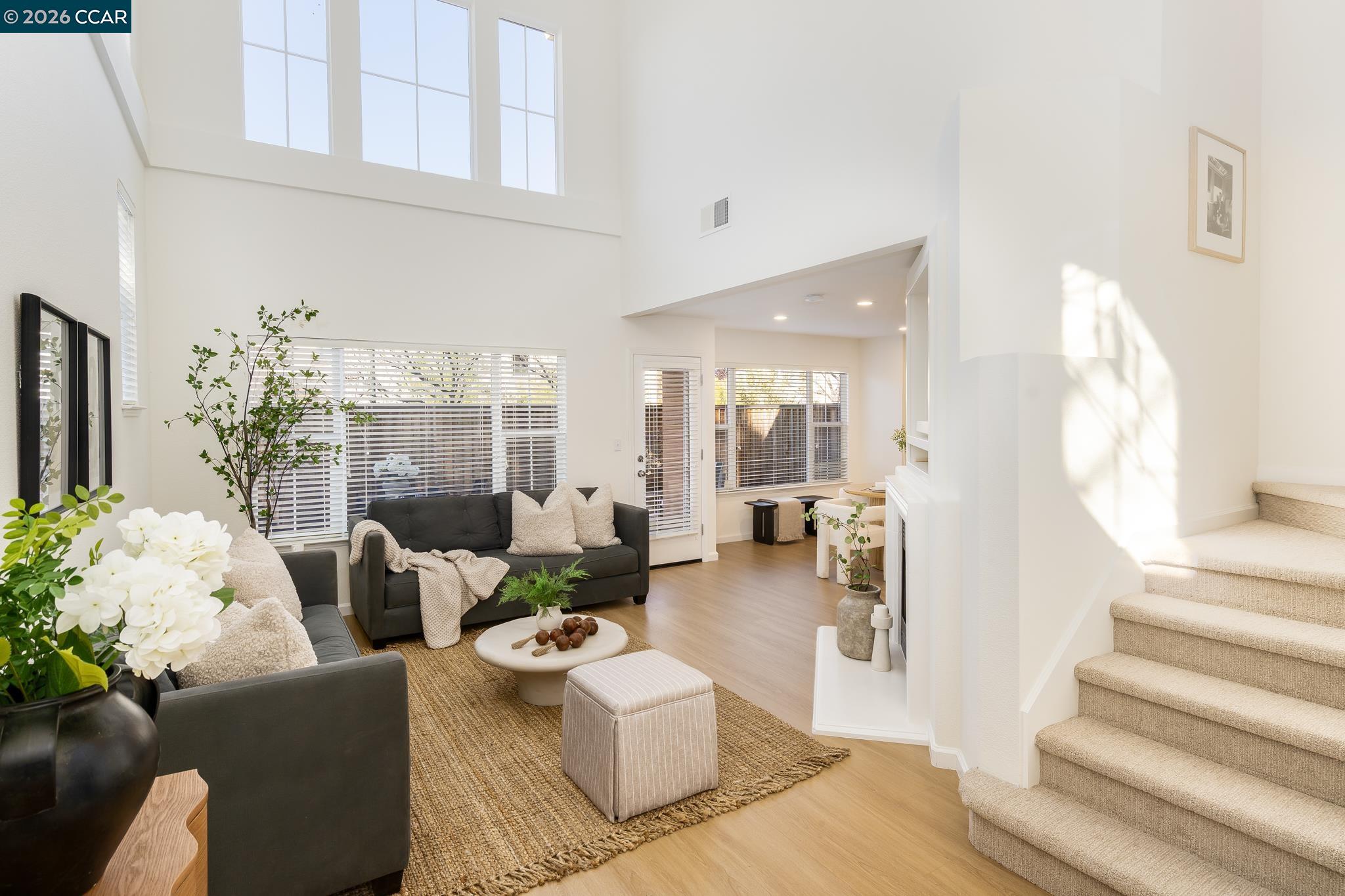 7110 Briza Loop San Ramon, CA 94582 - Photo 2 of 25 a living room with furniture and a fireplace