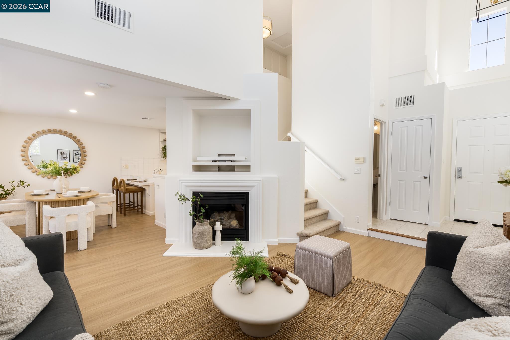 7110 Briza Loop San Ramon, CA 94582 - Photo 4 of 25 a living room with furniture and a fireplace