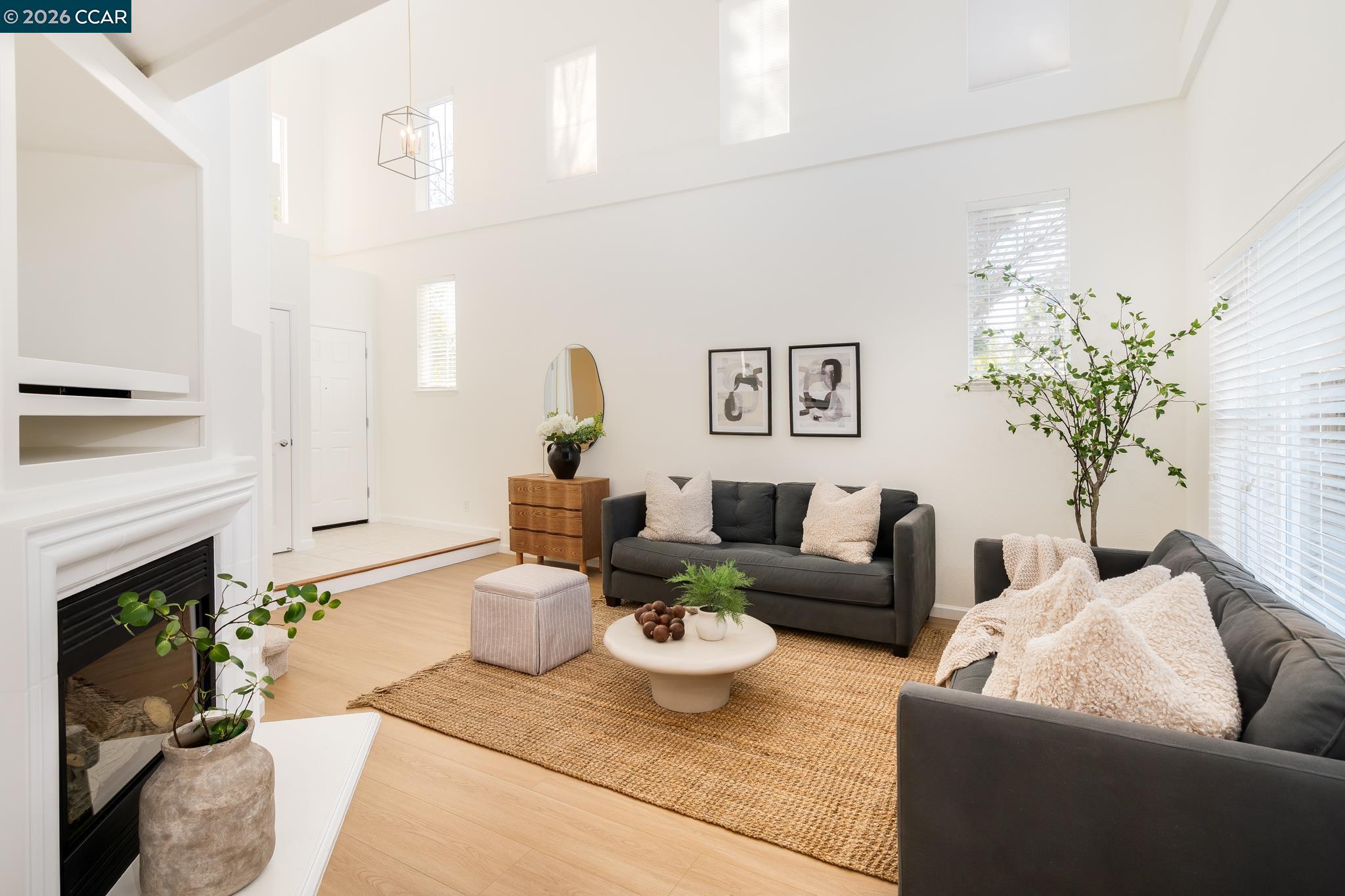 7110 Briza Loop San Ramon, CA 94582 - Photo 5 of 25 a living room with furniture and a fireplace