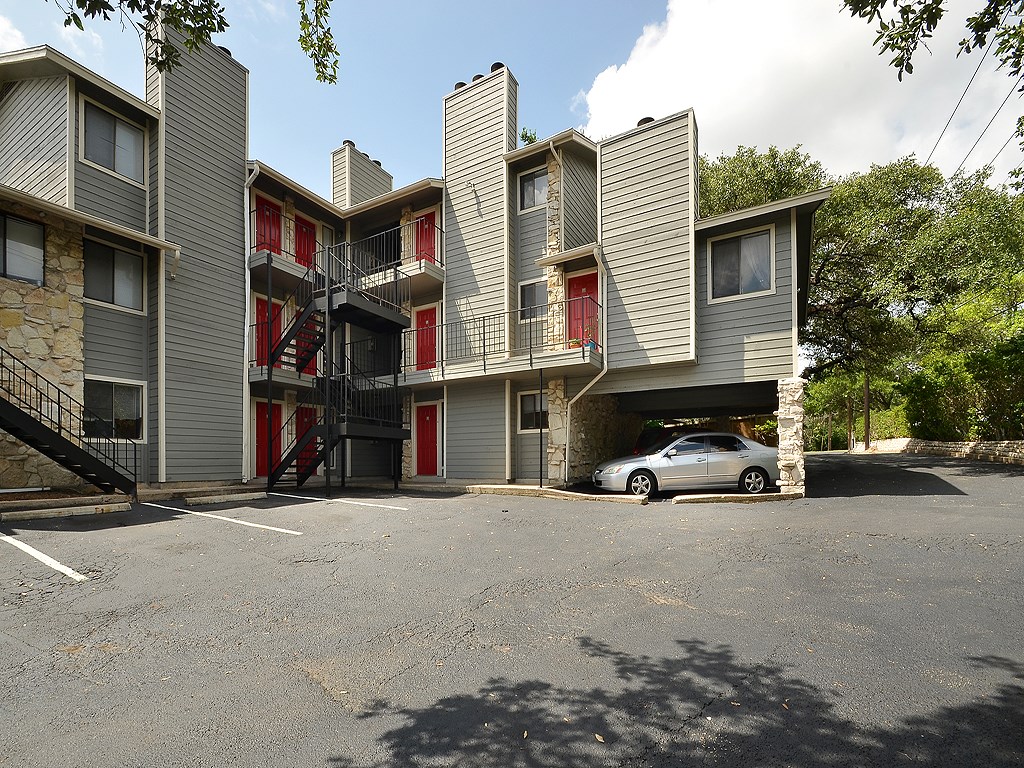 9079 Jollyville Road, Unit 303 Austin, TX 78759 - Photo 9 of 25 a view of car parked in front of building