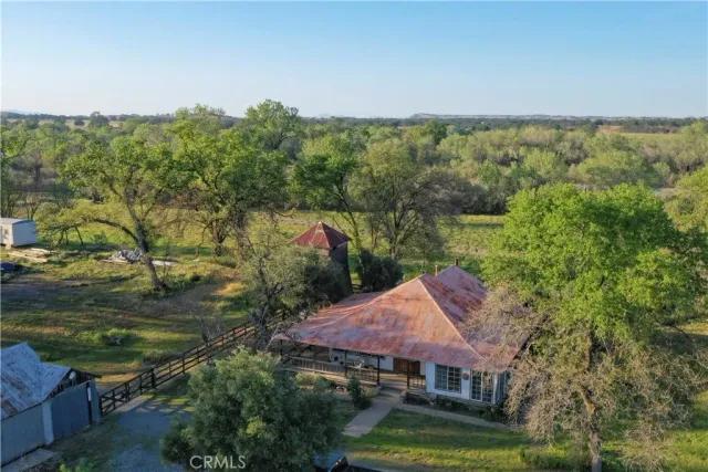 a view of a lake with a yard