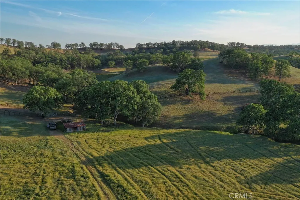 15385 Weston Road Corning, CA 96029 - Photo 34 of 75 a view of a lake with a yard