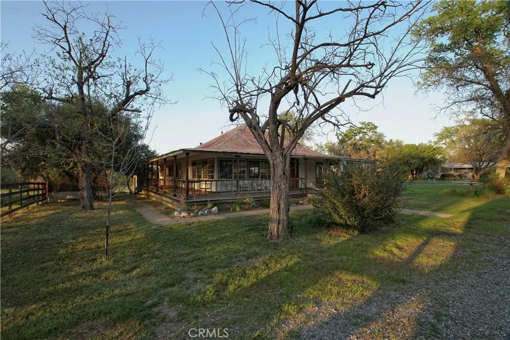 15385 Weston Road Corning, CA 96029 - Photo 52 of 75 a view of a yard with a house in the background