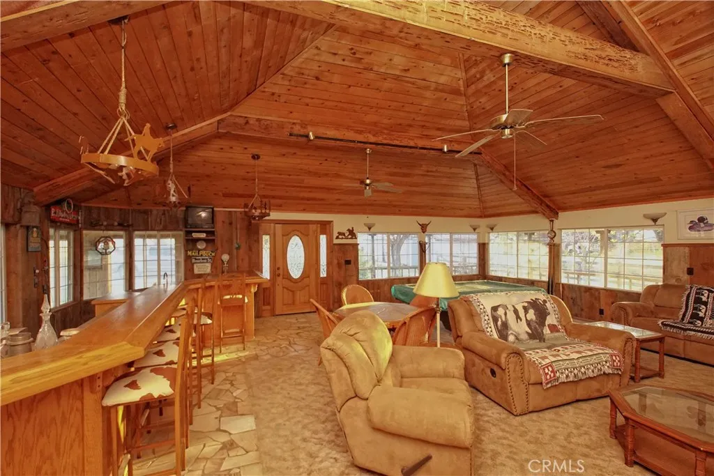 15385 Weston Road Corning, CA 96029 - Photo 58 of 75 a view of a livingroom with furniture and floor to ceiling window