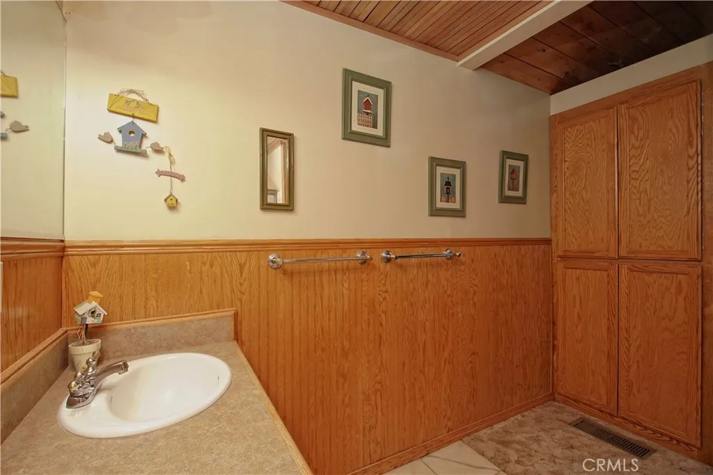 15385 Weston Road Corning, CA 96029 - Photo 70 of 75 a bathroom with a sink and a mirror