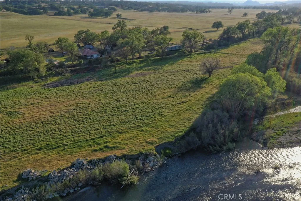15385 Weston Road Corning, CA 96029 - Photo 10 of 75 a view of a lake with a mountain in the background
