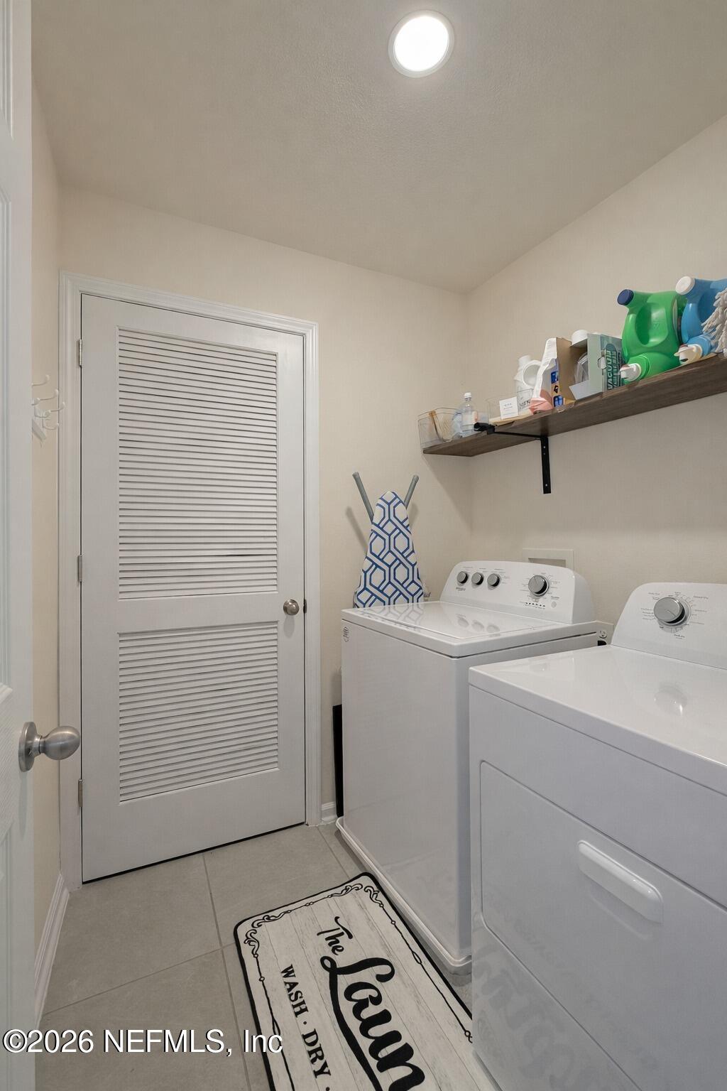 597 Coastline Way Street St. Augustine, FL 32092 - Photo 16 of 21 a room with storage and utility