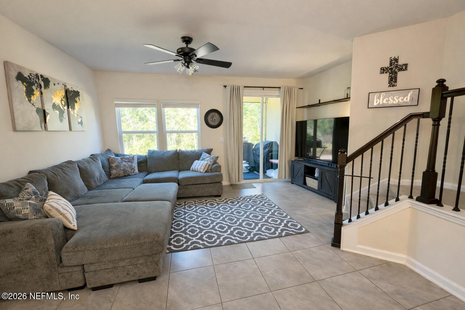 597 Coastline Way Street St. Augustine, FL 32092 - Photo 9 of 21 a living room with furniture and a window