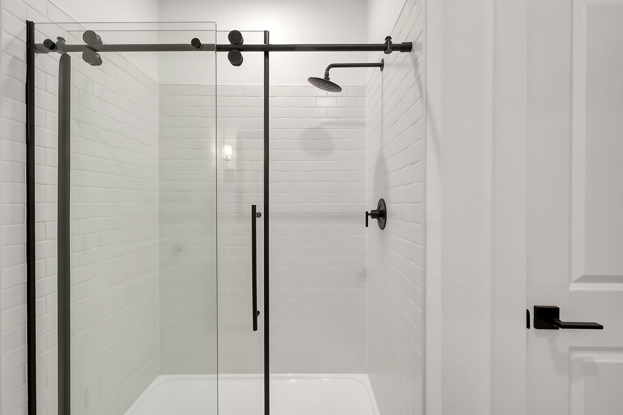 516 Monarch Trail Huntsville, TX 77340 - Photo 14 of 20 a bathroom with a shower