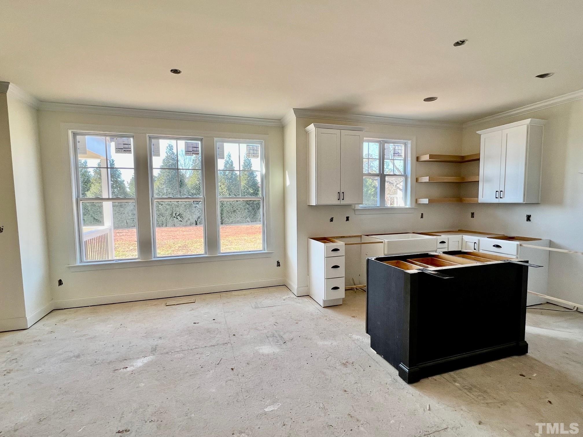 15 Tamaran Ct Spring Spring Hope, NC 27882 - Photo 9 of 29 a kitchen with stainless steel appliances granite countertop a stove and a refrigerator