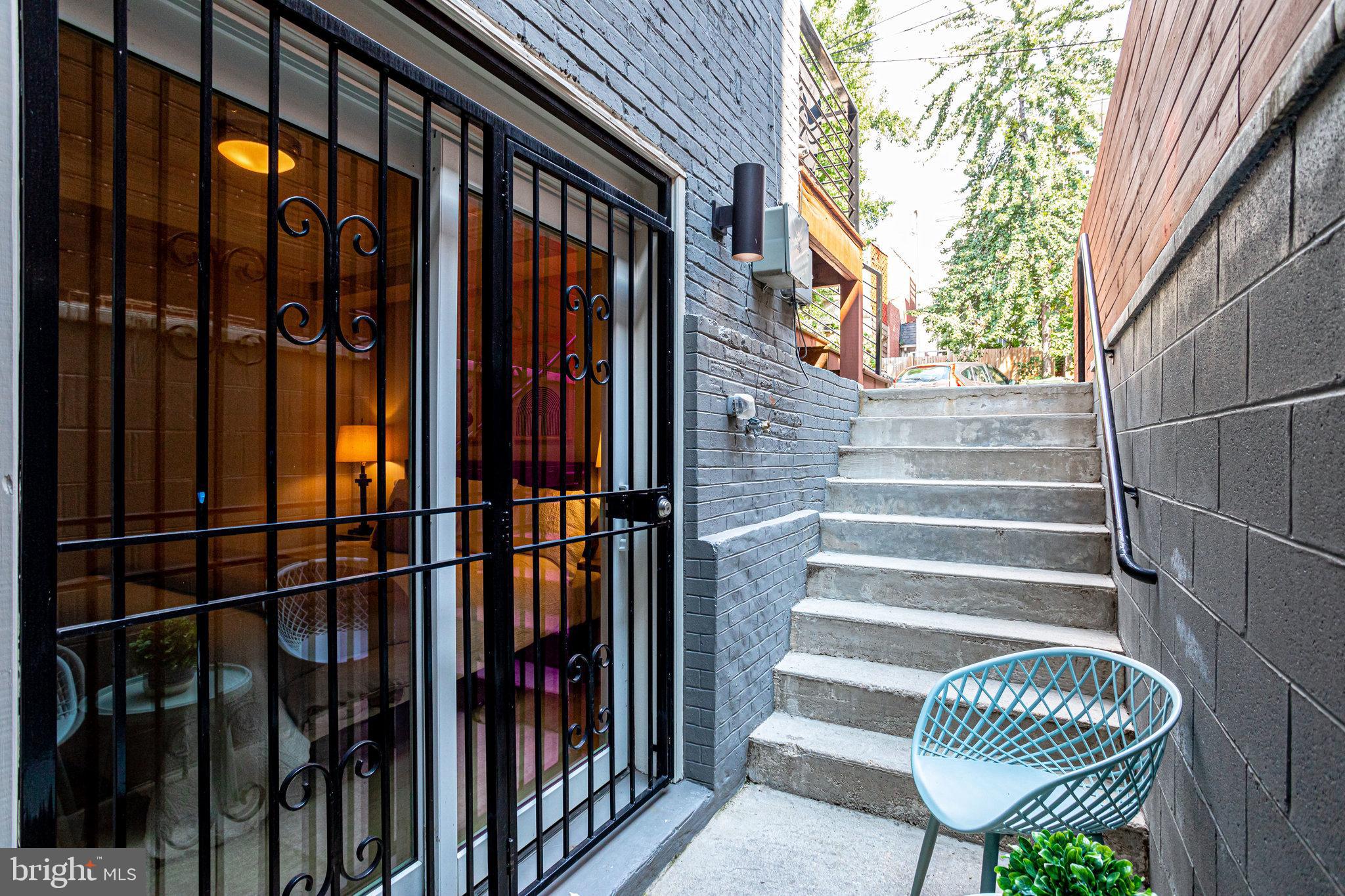 1817 Riggs Place Northwest, Unit 1 Washington, DC 20009 - Photo 29 of 31 common area sitting area and walkway