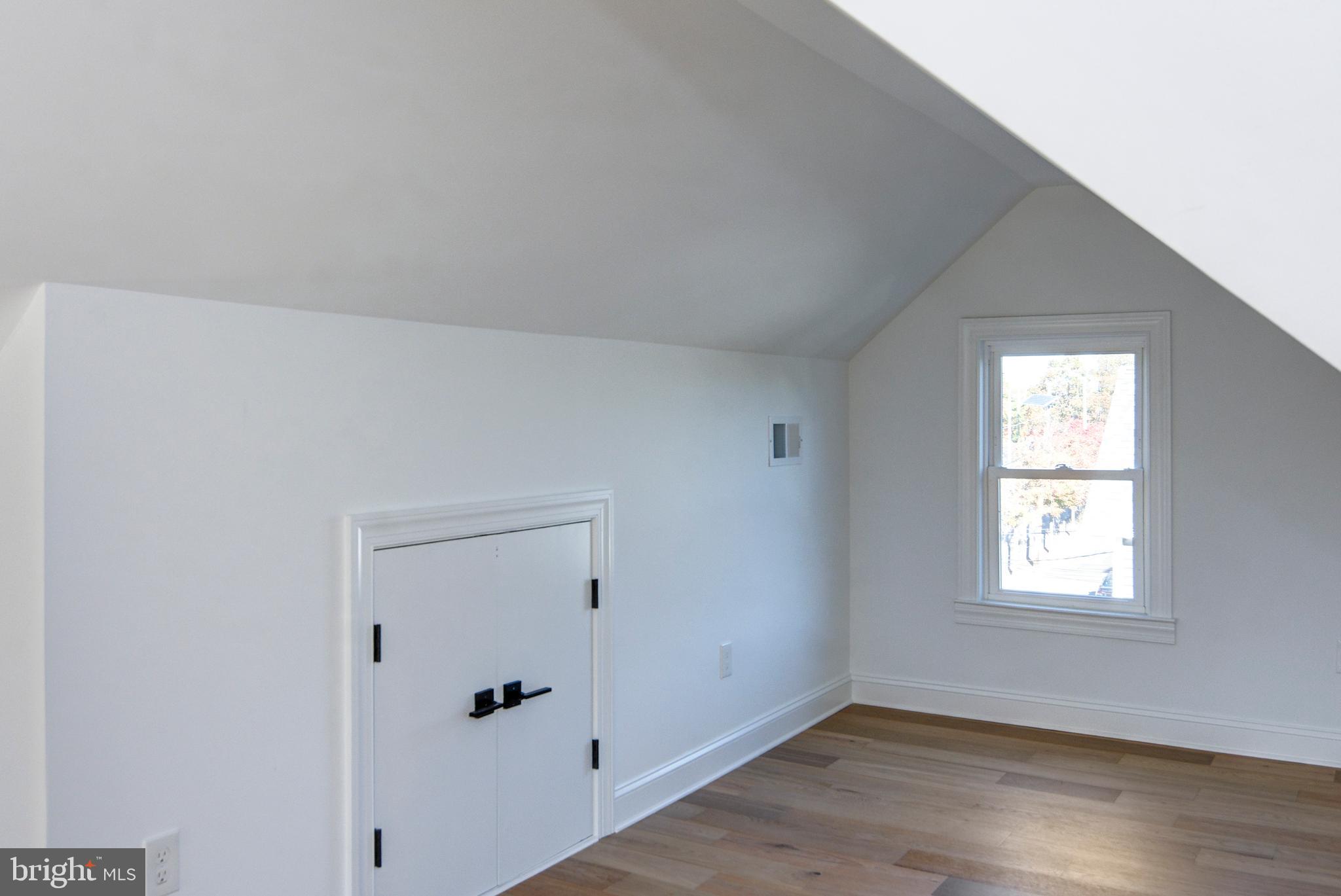 13 Wilkins Avenue Haddonfield, NJ 08033 - Photo 49 of 49 an empty room with wooden floor and window