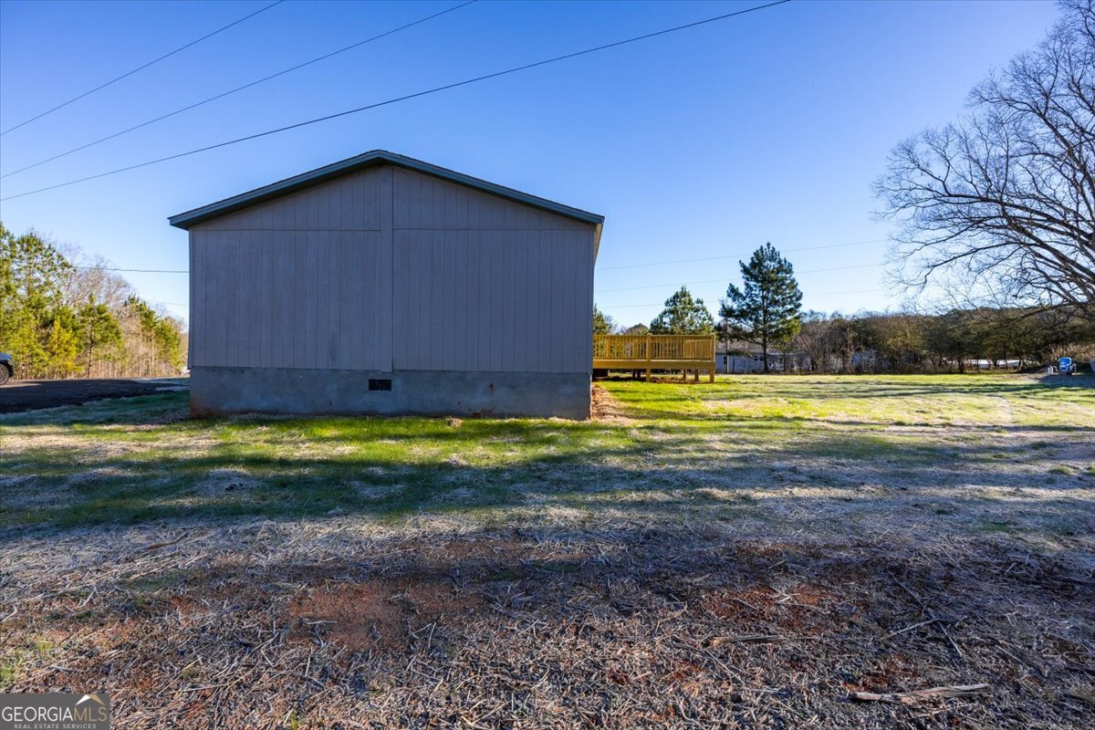 583 Greene Settlement Road Gray, GA 31032 - Photo 25 of 25 a view of a house with a yard