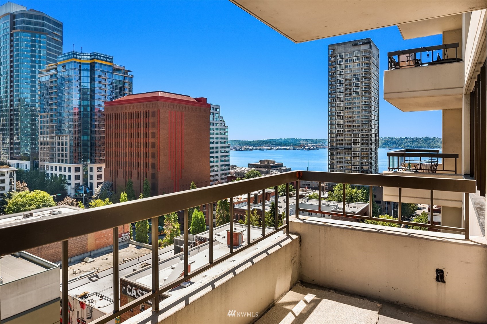 2201 3rd Avenue, Unit 1501 Seattle, WA 98121 - Photo 18 of 34 a balcony view with a large window and outdoor seating