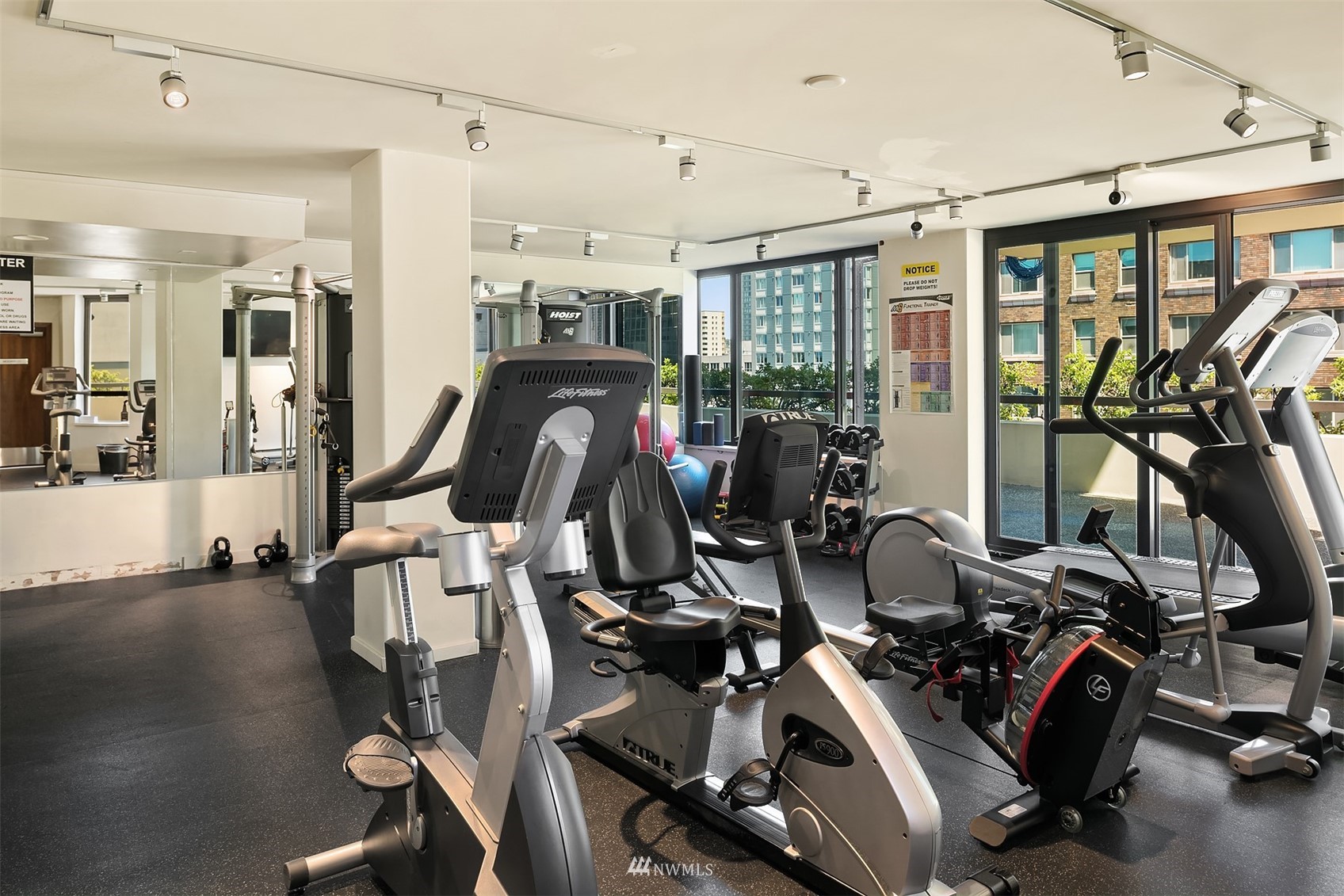 2201 3rd Avenue, Unit 1501 Seattle, WA 98121 - Photo 28 of 34 a view of a room with gym equipment