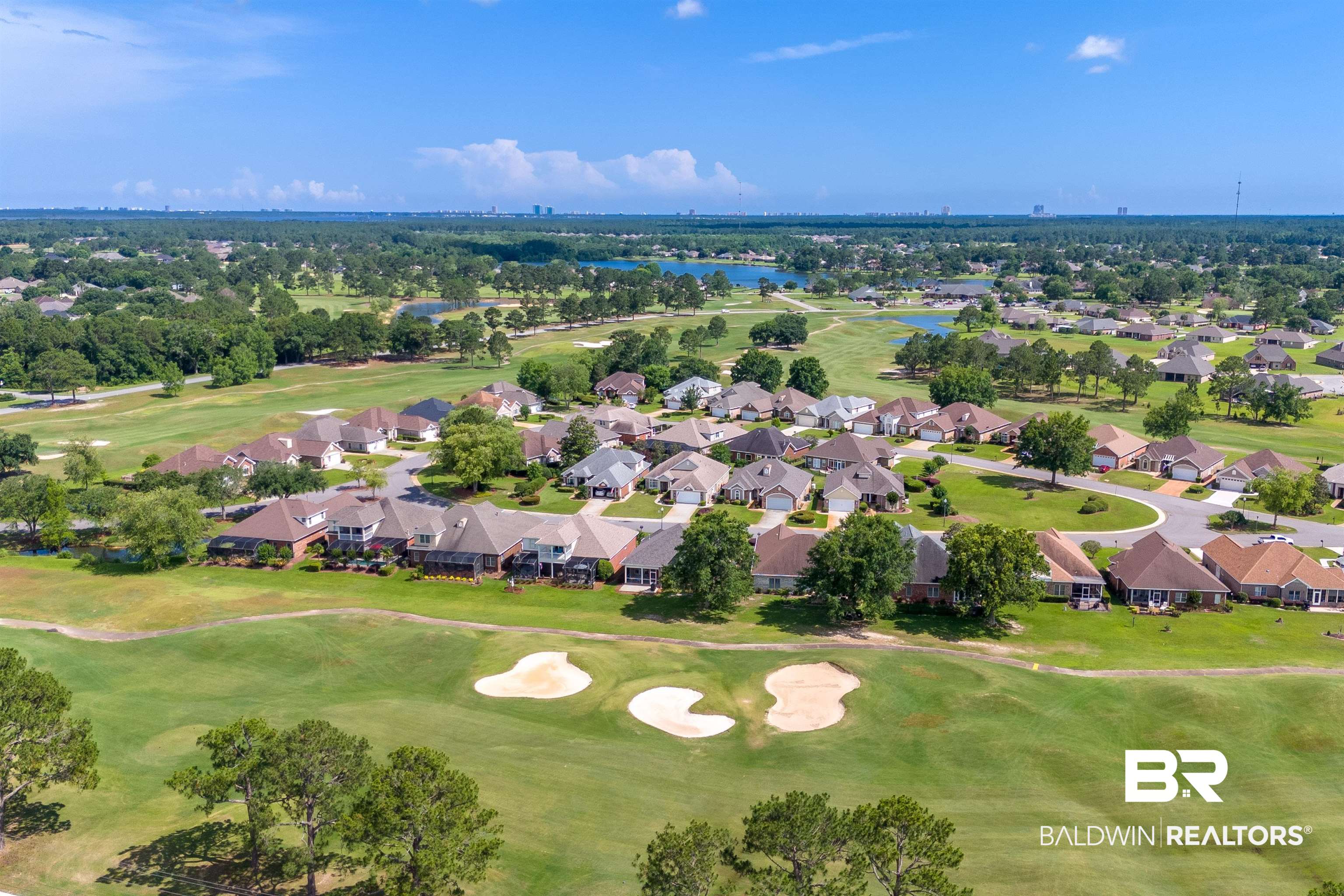 22739 Inverness Way Foley, AL 36535 - Photo 67 of 80 Aerial perspective of suburban area featuring a large body of water and a local golf course