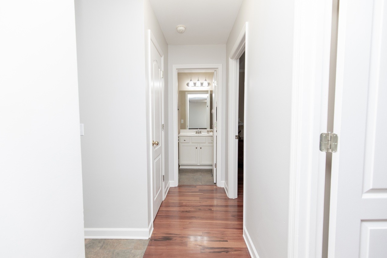 5012 John Hagar Road Hermitage, TN 37076 - Photo 26 of 45 a view of a hallway with wooden floor