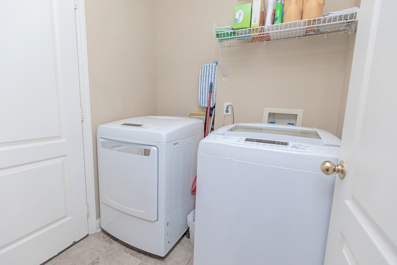 5012 John Hagar Road Hermitage, TN 37076 - Photo 31 of 45 a utility room with dryer and washer