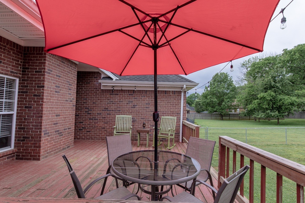5012 John Hagar Road Hermitage, TN 37076 - Photo 32 of 45 a backyard of a house with table and chairs