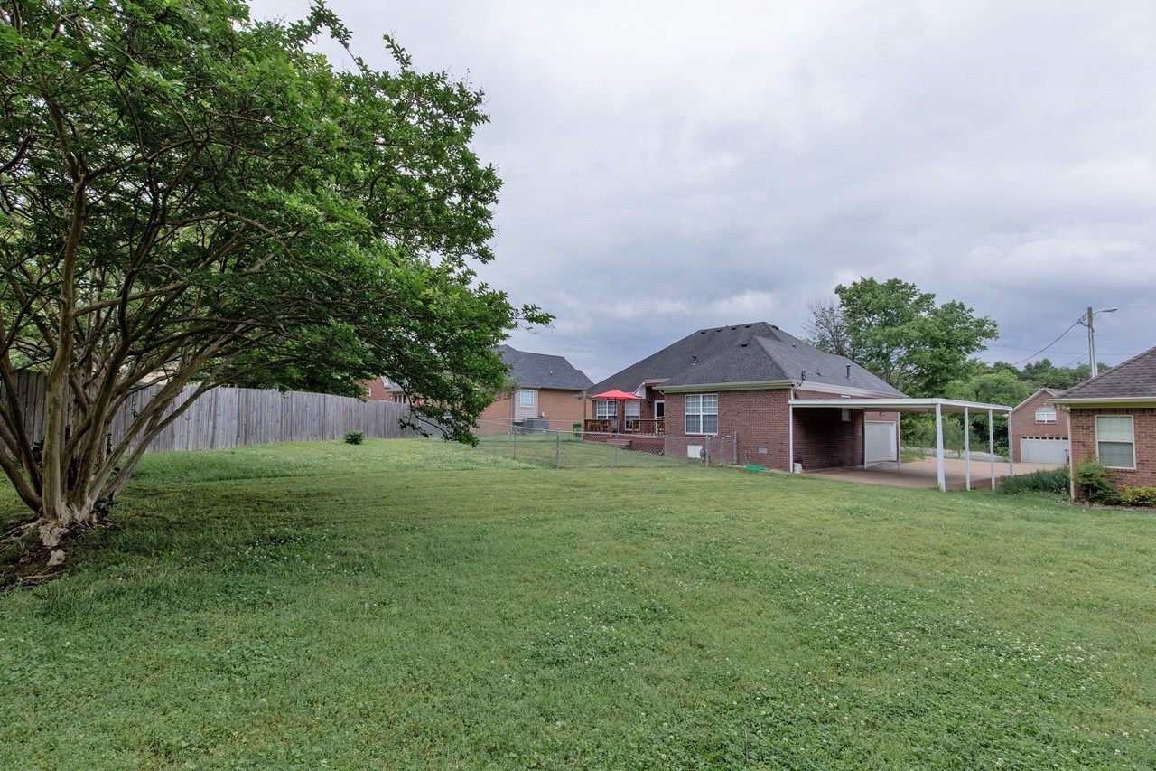5012 John Hagar Road Hermitage, TN 37076 - Photo 42 of 45 a front view of a house with a garden