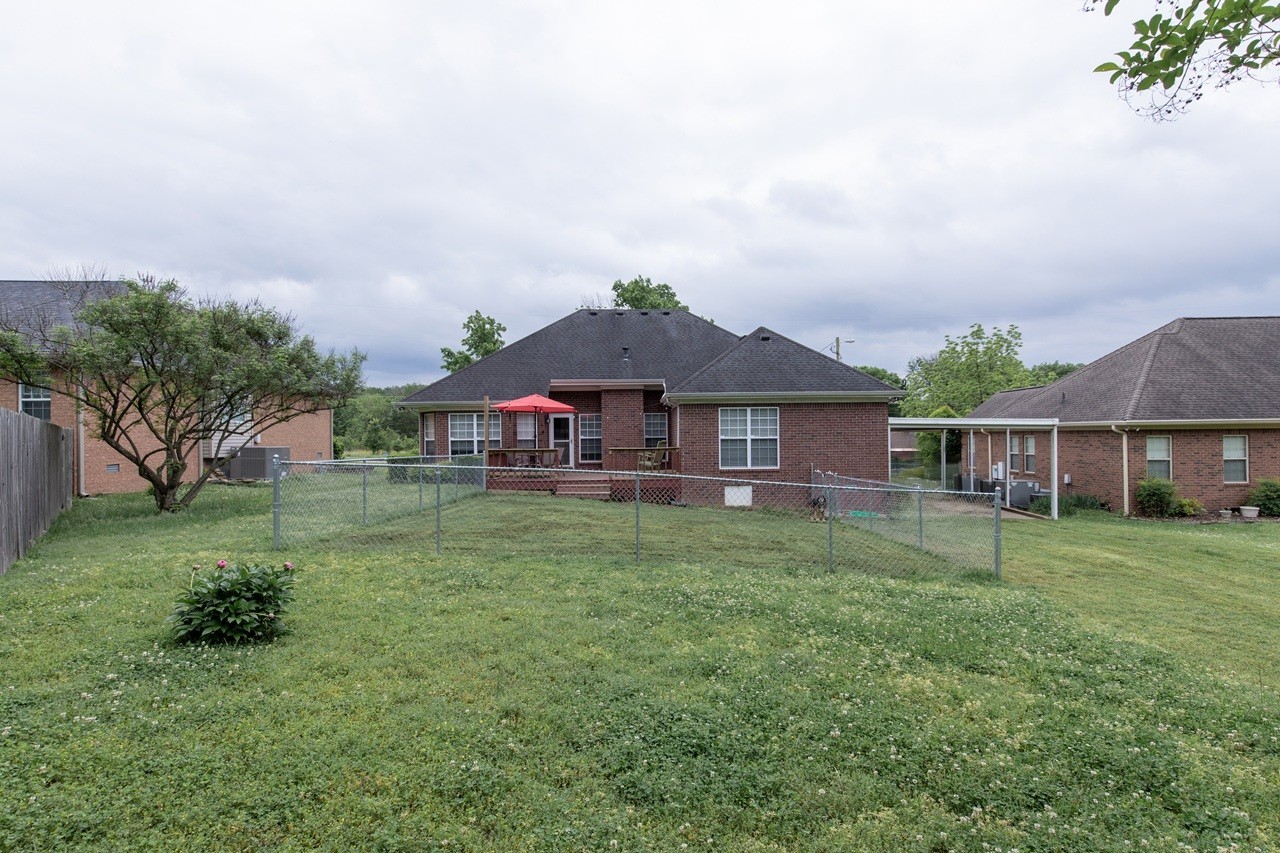 5012 John Hagar Road Hermitage, TN 37076 - Photo 44 of 45 a front view of a house with a garden