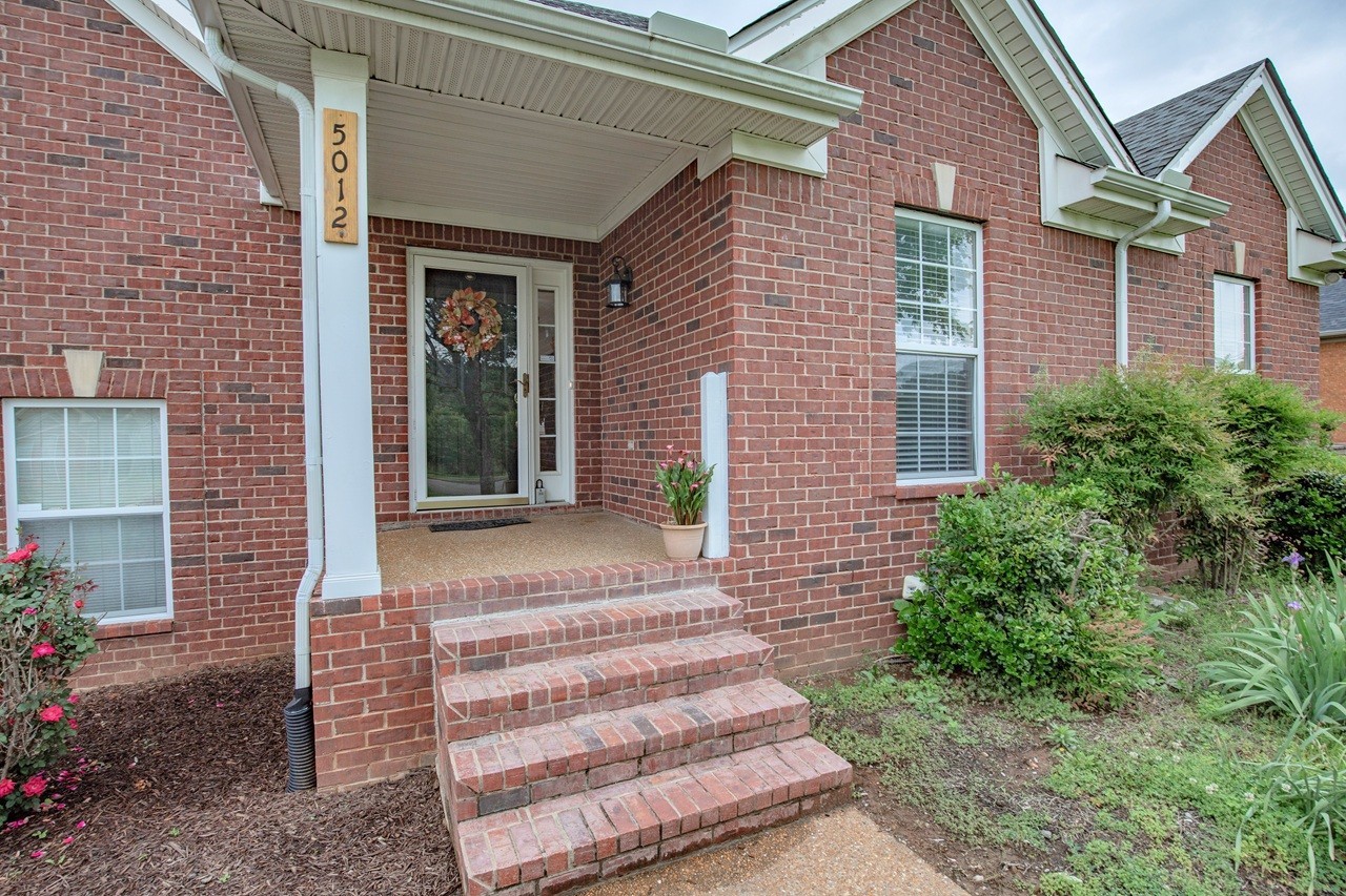 5012 John Hagar Road Hermitage, TN 37076 - Photo 5 of 45 a front view of a house with a porch
