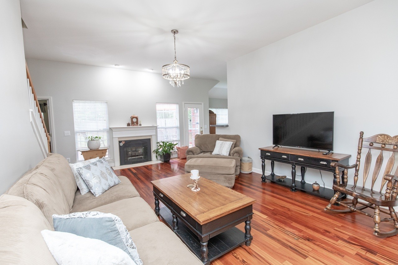 5012 John Hagar Road Hermitage, TN 37076 - Photo 10 of 45 a living room with furniture fireplace and flat screen tv