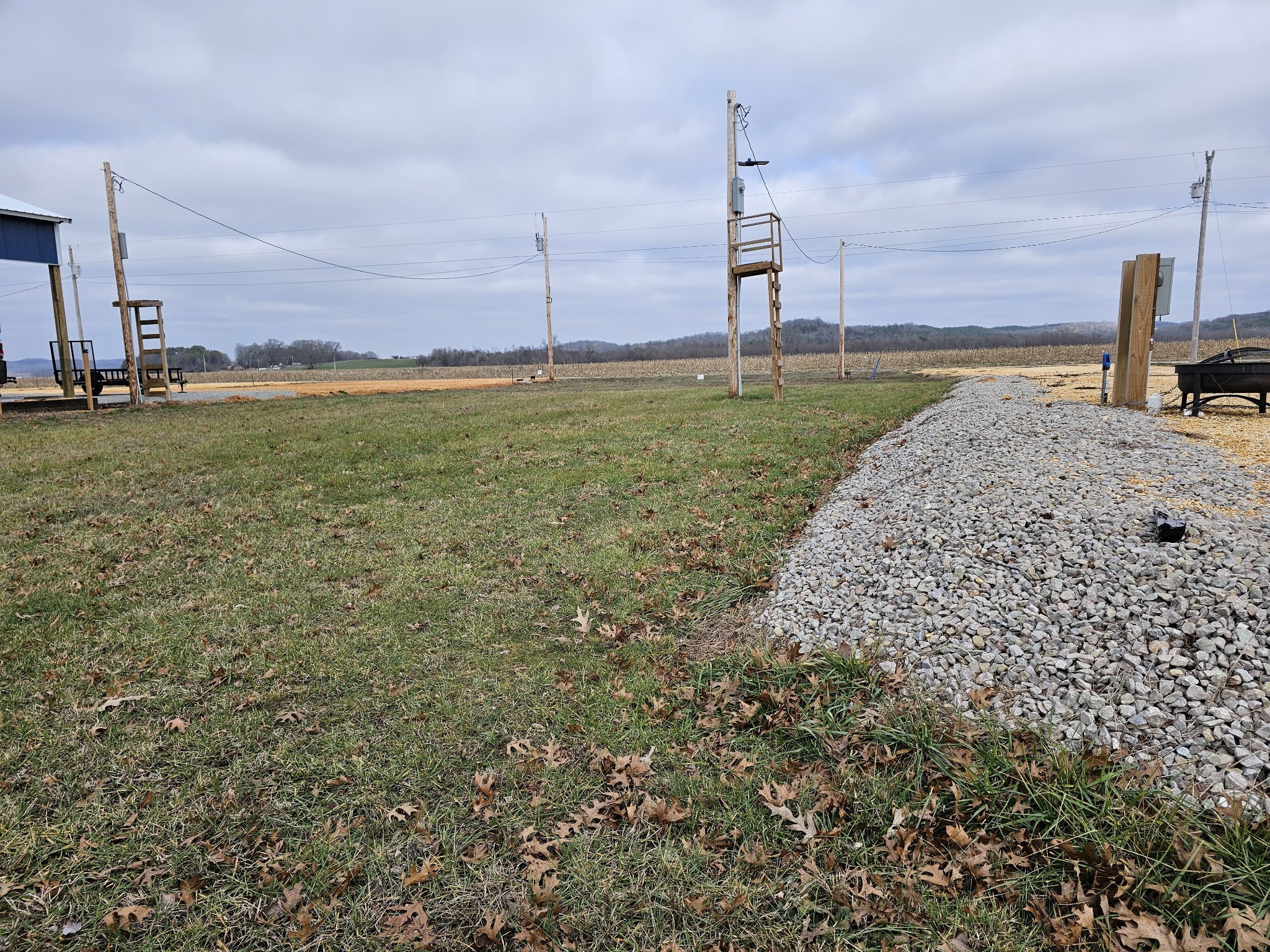 855 Hardin Bottom River Road Clifton, TN 38425 - Photo 7 of 23 a view of a ocean with a big yard and a large building