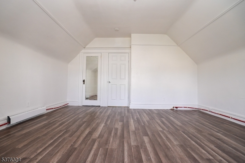 26 Treacy Avenue, Unit 1 Newark, NJ 07108 - Photo 4 of 18 a view of room with wooden floor