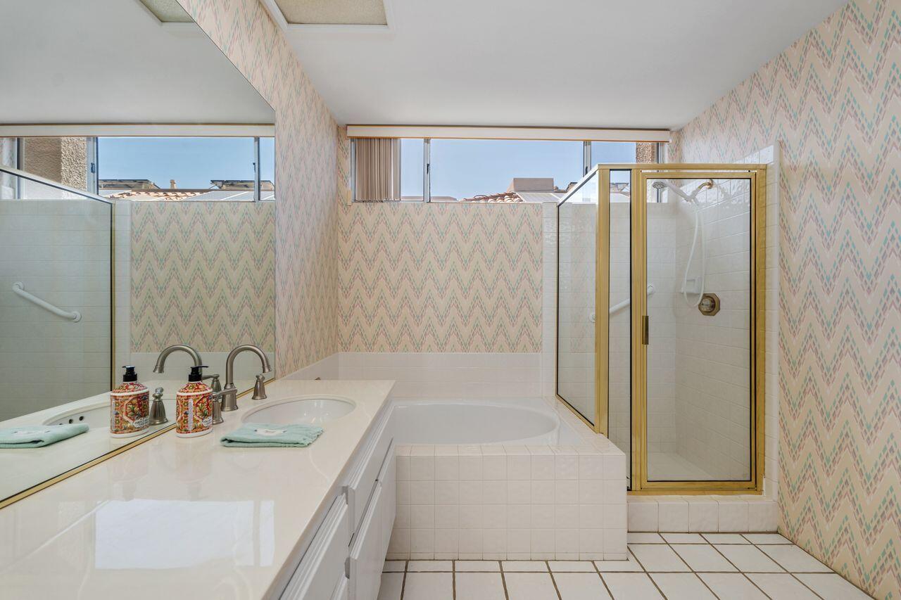 36 Colonial Drive Rancho Mirage, CA 92270 - Photo 19 of 36 a bathroom with a sink and a mirror