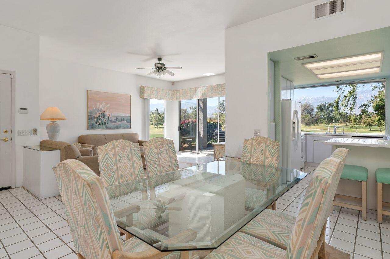 36 Colonial Drive Rancho Mirage, CA 92270 - Photo 10 of 36 a living room with furniture and a large window