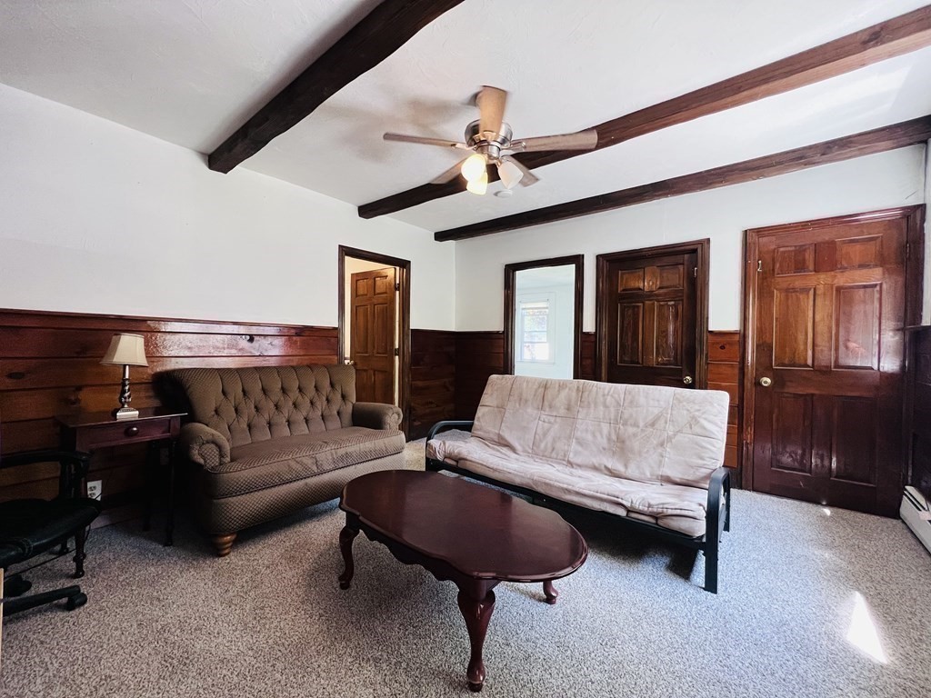 72 Oak Street Middleboro, MA 02346 - Photo 11 of 42 a living room with furniture and a dining table