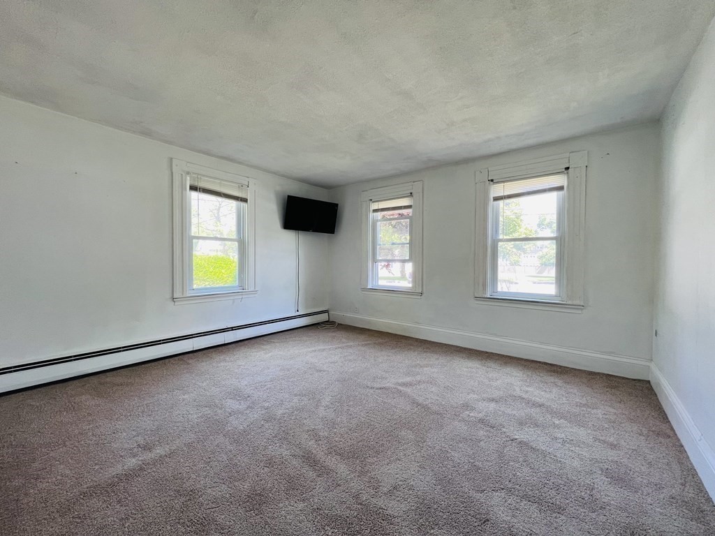 72 Oak Street Middleboro, MA 02346 - Photo 12 of 42 an empty room with windows