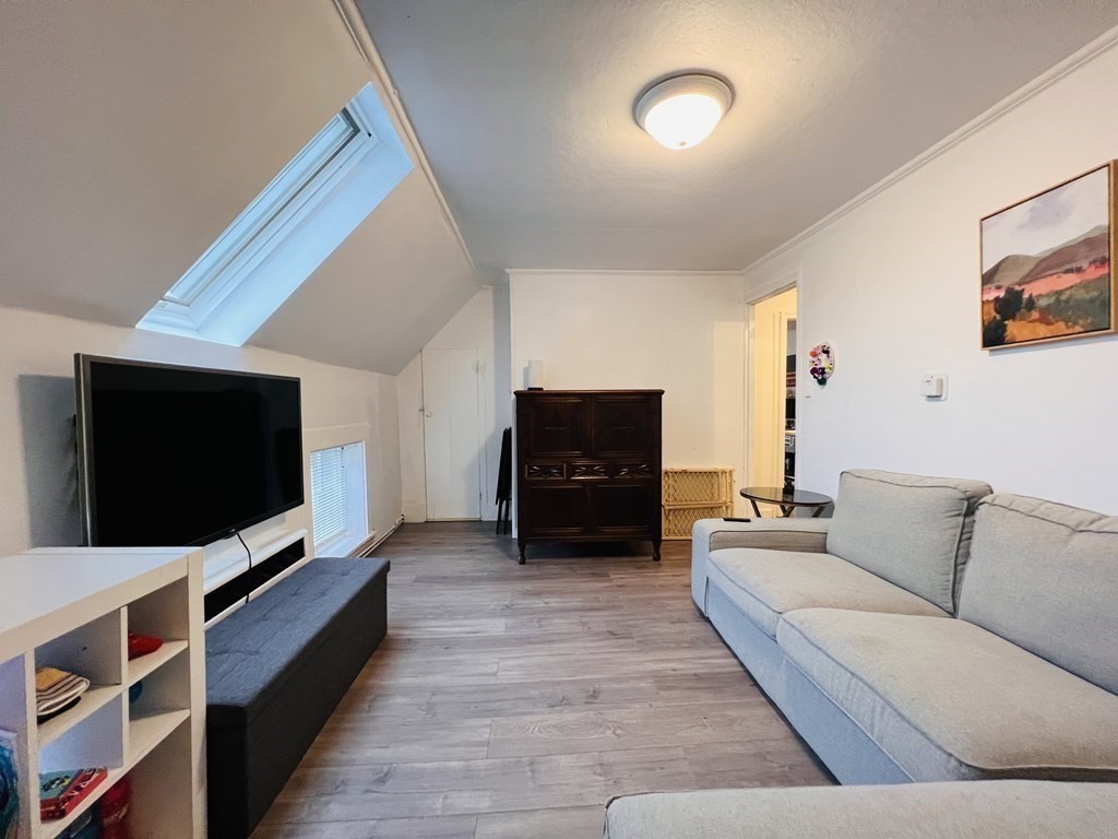 72 Oak Street Middleboro, MA 02346 - Photo 22 of 42 a living room with furniture and a flat screen tv